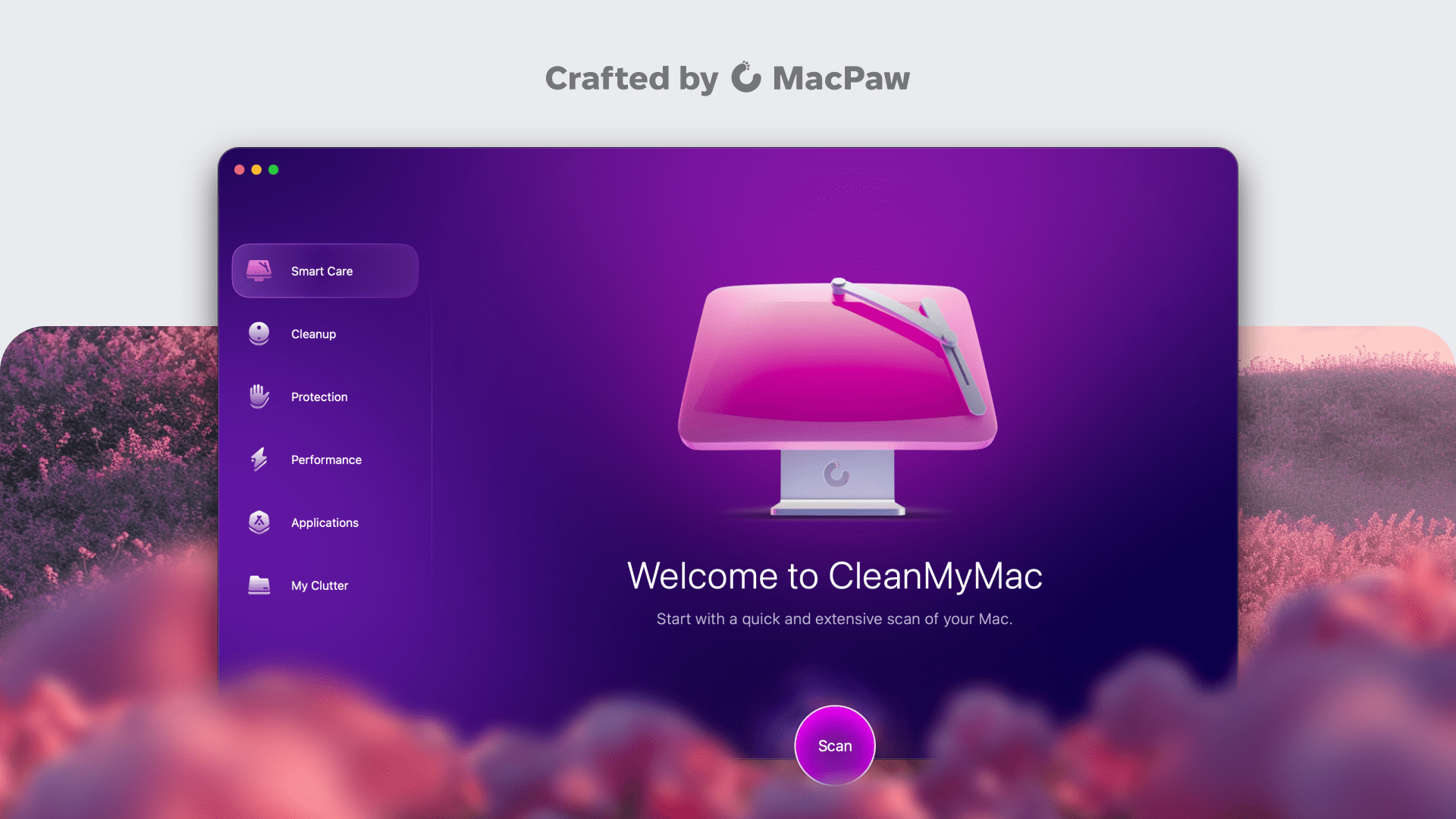 Screenshot of the CleanMyMac app interface by MacPaw. The interface features a large pink monitor icon with a wiper blade, indicating cleaning. The left sidebar includes options: Smart Care, Cleanup, Protection, Performance, Applications, and My Clutter. The main section welcomes users with the text 'Welcome to CleanMyMac' and a 'Scan' button at the bottom.