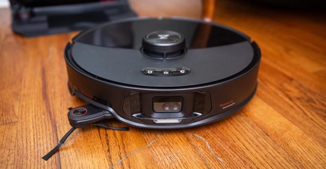 The front of the Roborock S8 MaxV Ultra as it rests on hardwood floor.