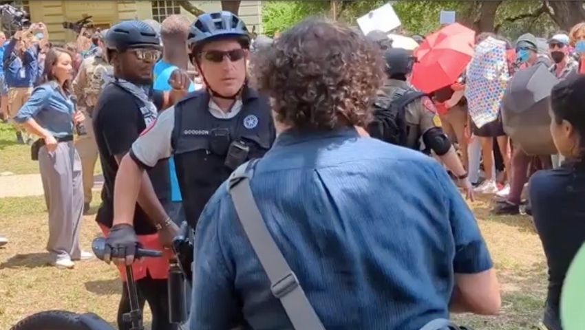 A State Trooper and former UT professor, Richard Heyman in a confrontation during the April 29th pro-Palestinian protest on UT-Austin's campus.