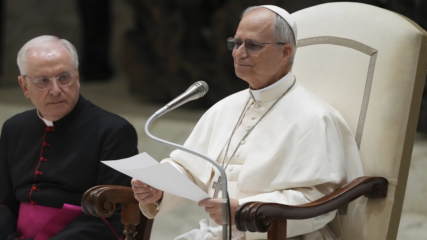 Pope Leo XIV meets with members of the international media in the Paul VI Hall at the Vatican, Monday, May 12, 2025. (AP Photo/Domenico Stinellis)