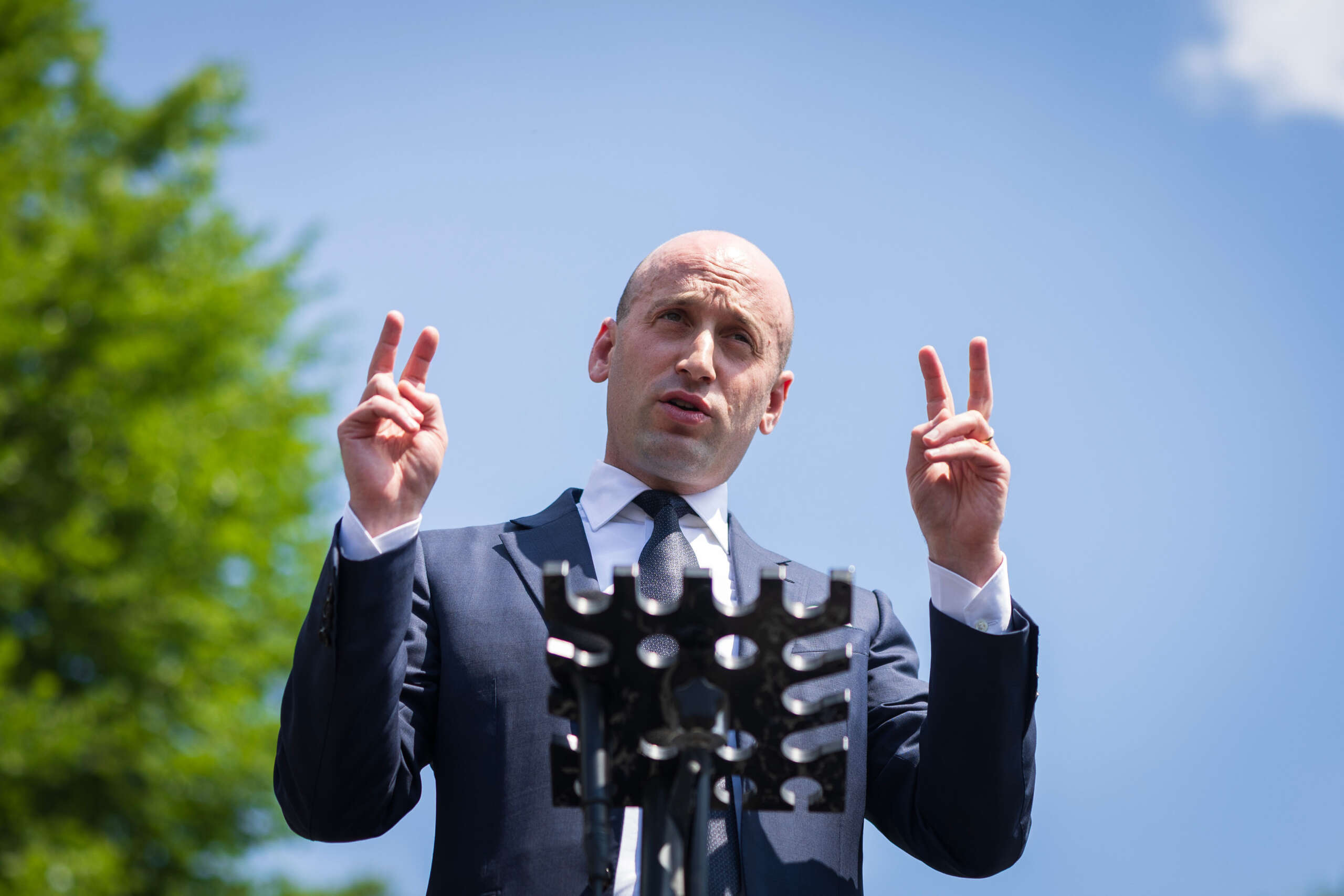 White House Deputy Chief of Staff Stephen Miller speaks to reporters following a television interview on the West Wing driveway on May 30, 2025, at the White House in Washington.