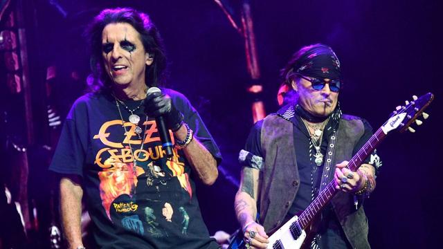 Alice Cooper and Johnny Depp perform onstage during a concert July 25, 2025 in London, England.