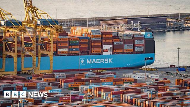 A container ship filled with containers at Barcelona's port in Spain