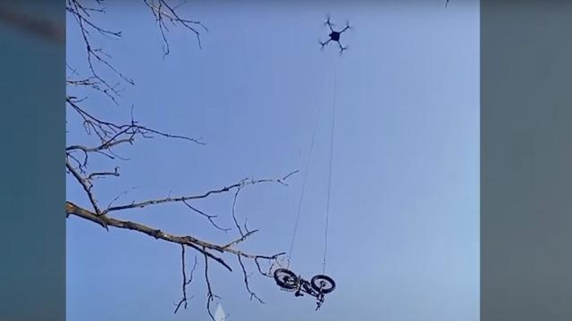 Photo of the drone and e-bike in question.